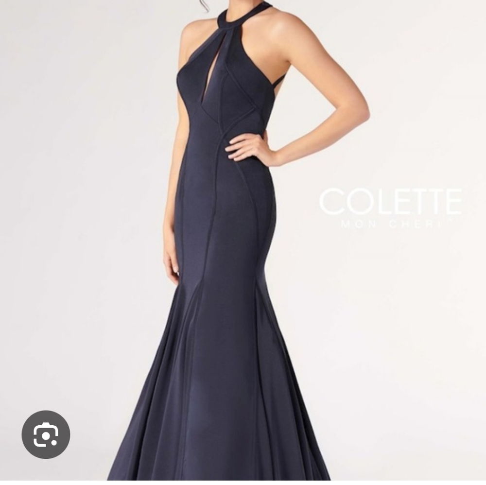 Size 0 navy halter style jersey trumpet prom/pageant/evening gown by Coltete NWT